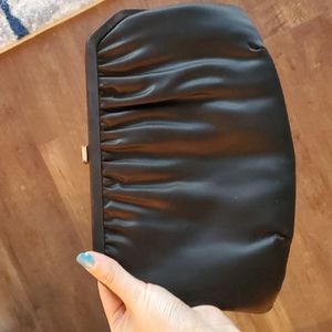 Black clutch with gold chain